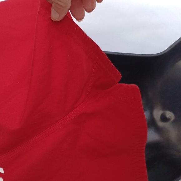 Red Nike swim shorts, Jr size medium - Picture 3 of 4